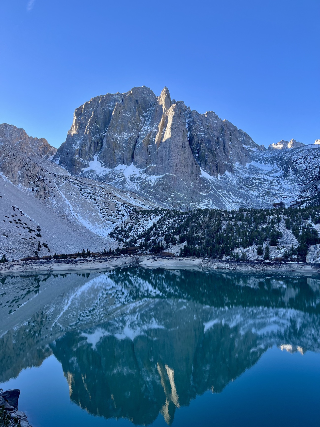 Temple Crag towering above the turquoise-blue water of Second Lake