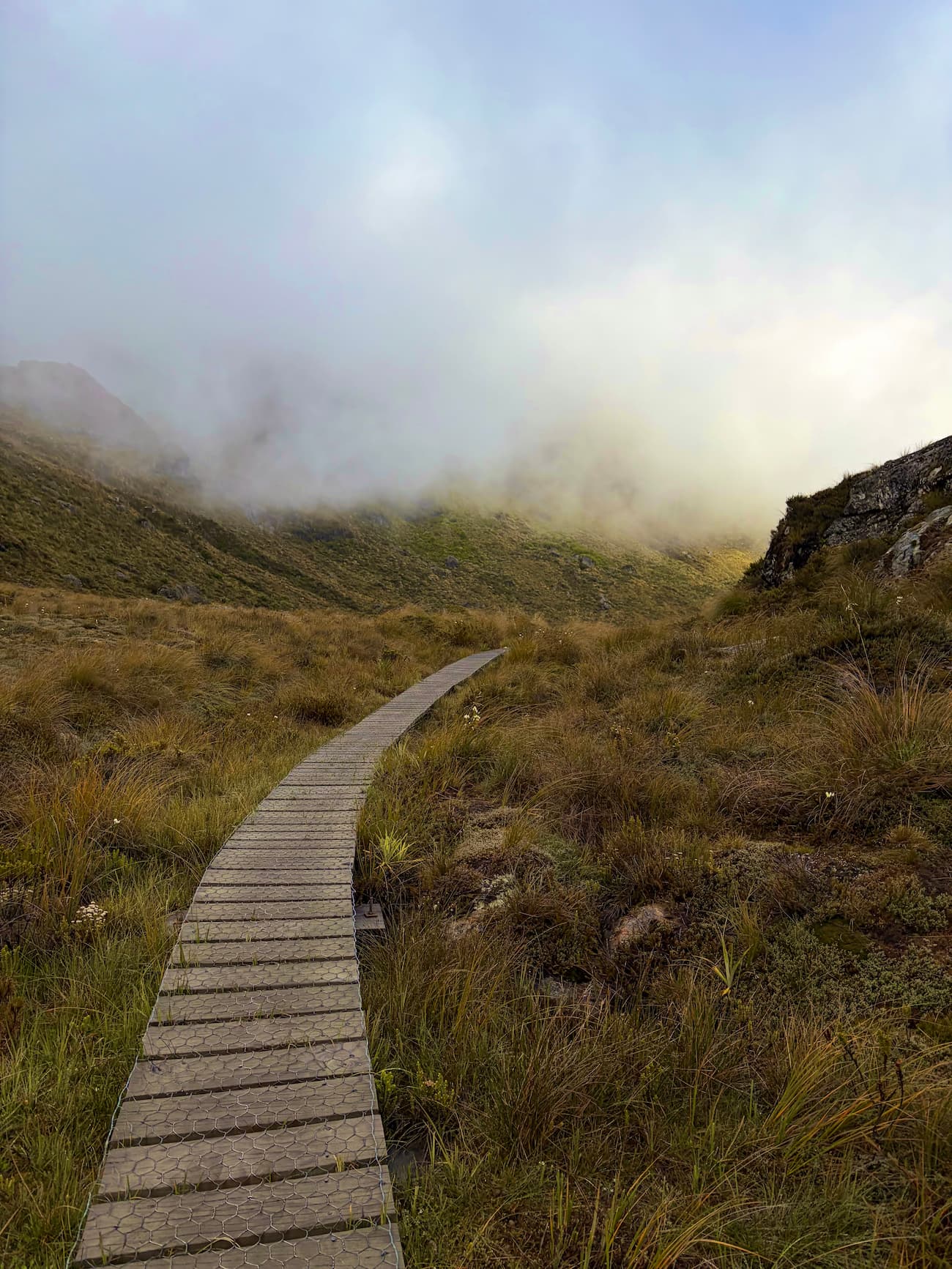 Routeburn Falls hut and surrounding mountain landscape